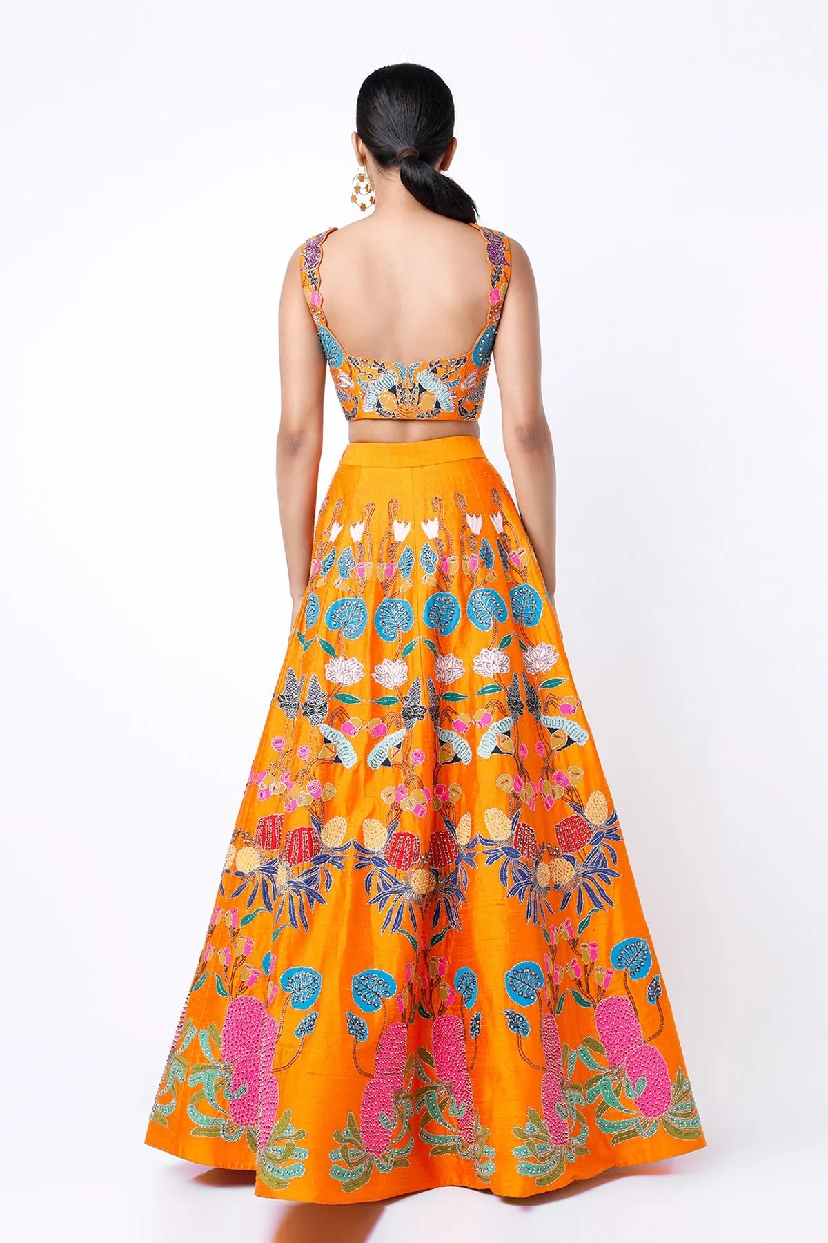 Orange Pastiche Raw Silk Appliquéd And Embellished Lehenga With Blouse And Cutwork Tulle Dupatta