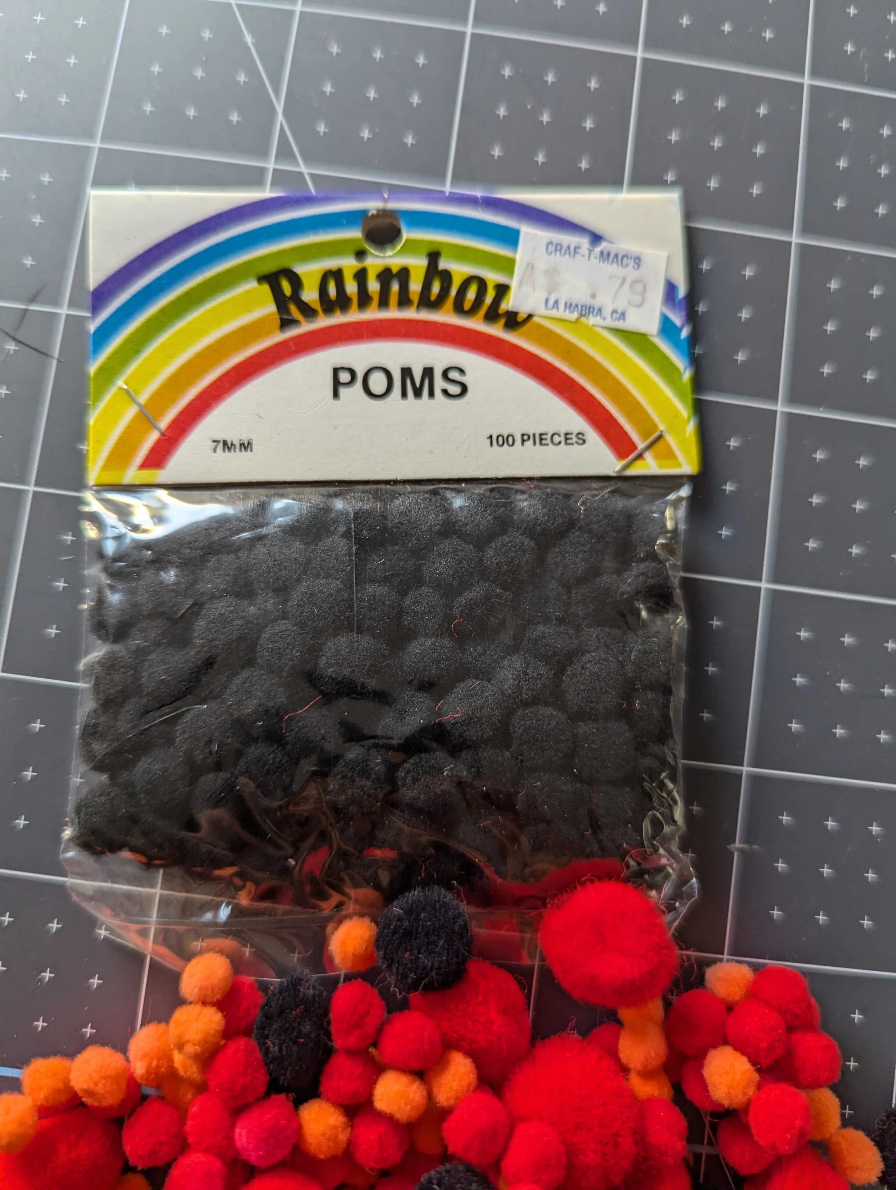 Red, Black, Orange and White Multi Size Pom Pom Assortment
